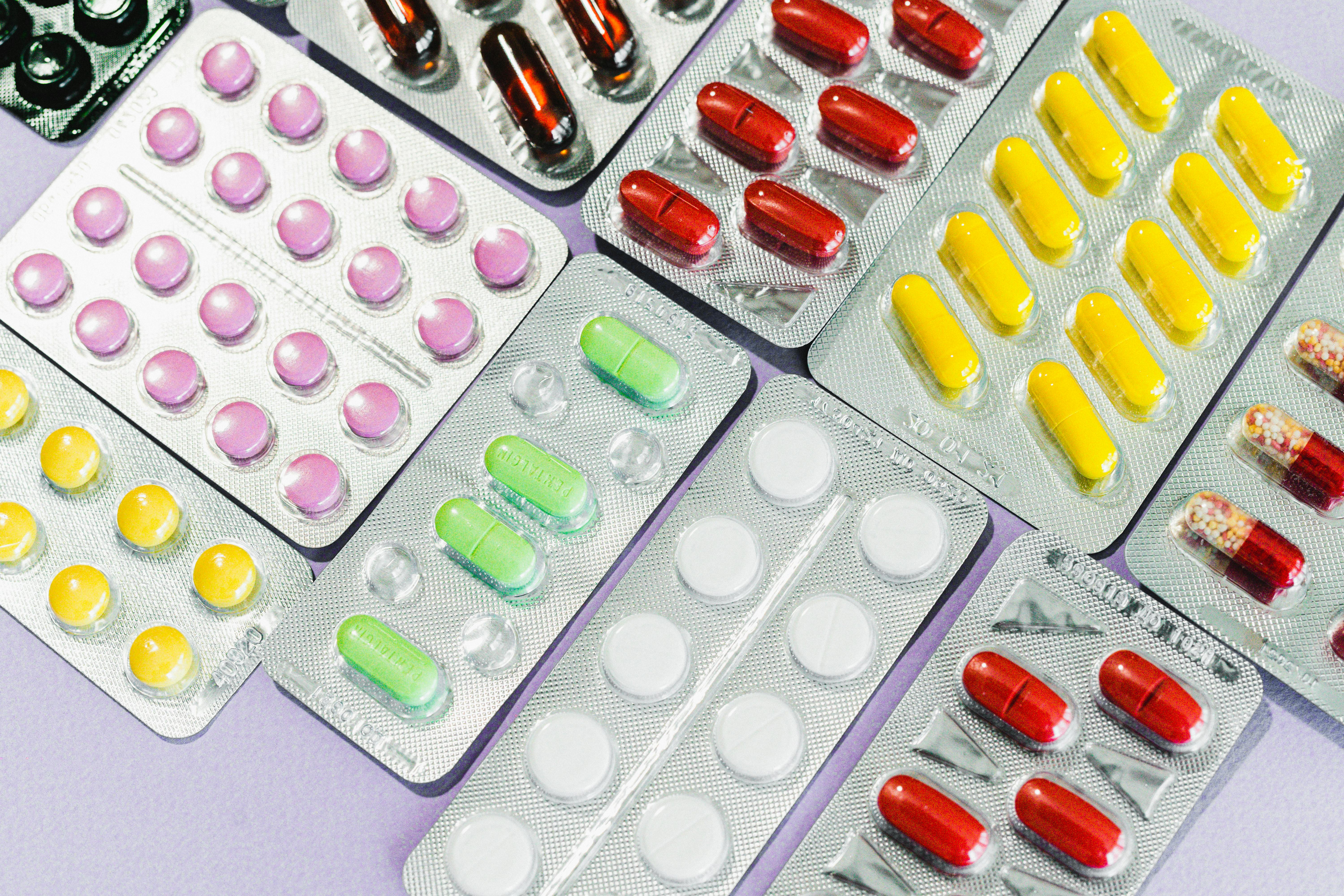 a variety of secure packages for different industries like pharmaceuticals and food, featuring clean design and the colors #3CB4E5 and #0A5776. - secure packaging solutions